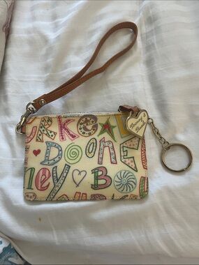 Dooney & Bourke Cream Multicolor Doodle Wristlet with Tan Strap